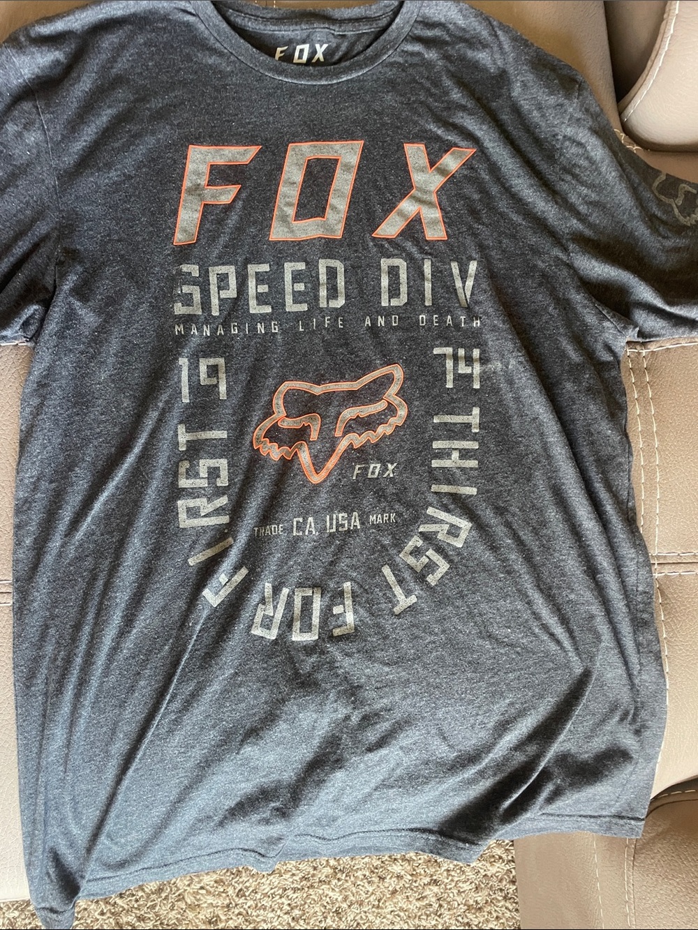Fox Men's Black Graphic Tee with Orange Trim Logo